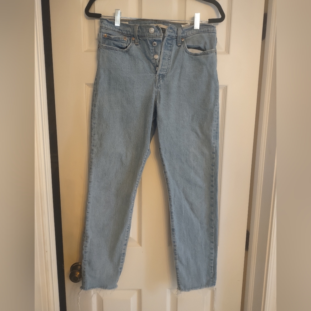 Levi wedgie light wash raw hem jeans
